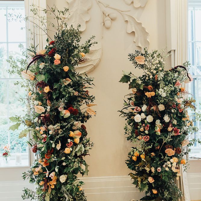 Vertical Autumn wedding flowers at Coworth Park