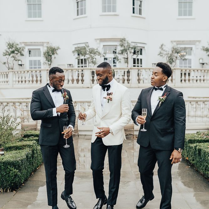 Groomsmen in tuxedos at Coworth Park wedding