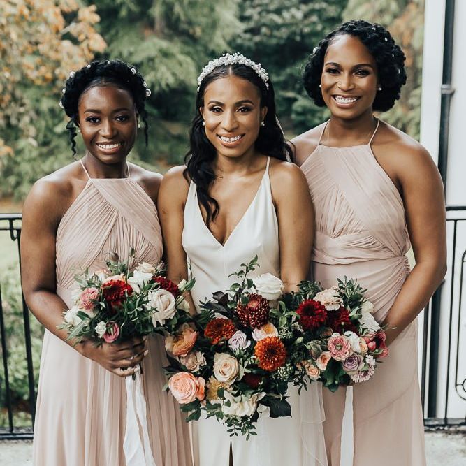 Bridesmaid picture with bridesmaids in pink dresses at Coworth Park