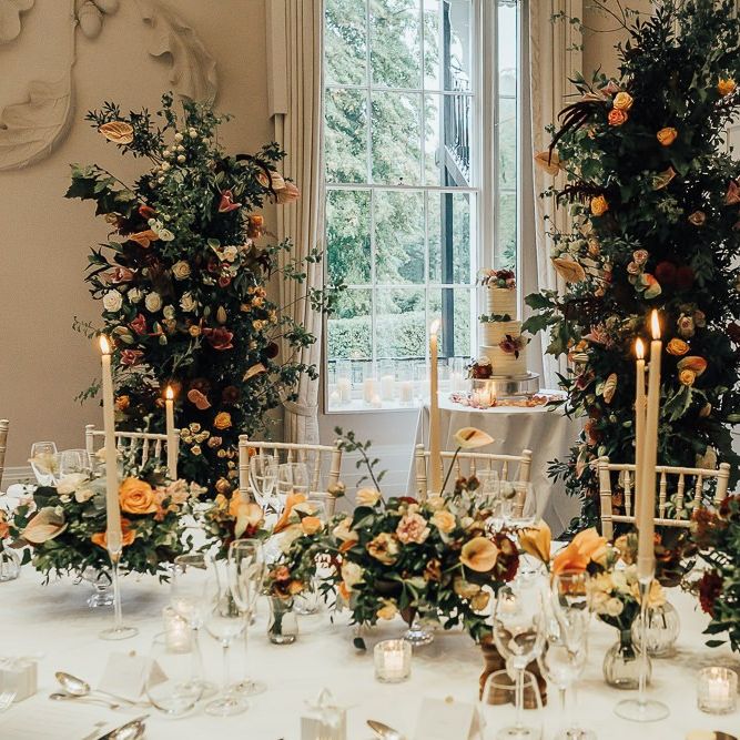 Wedding reception table flowers and decor at Coworth Park
