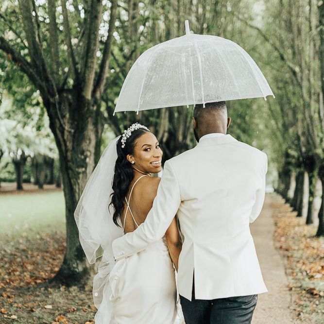 Stylish bride and groom at black tie wedding