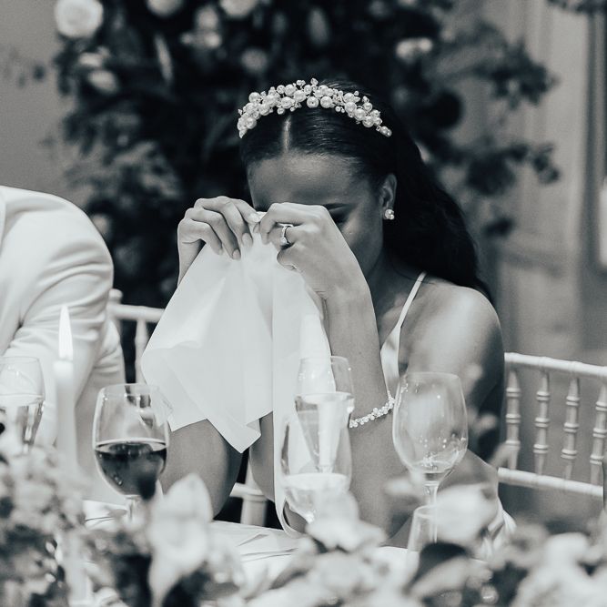 Emotional bride during wedding reception speeches