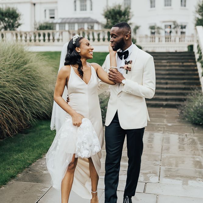 Stylish bride and groom portrait by Rebecca Carpenter Photography at Coworth Park