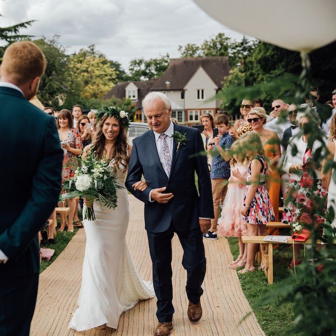 Wedding Ceremony | Bridal Entrance in La Sposa Gown from Mirror Mirror Bridal | Groom in Paul Smith Suit | Outdoor Wedding Ceremony &amp; Tipi Reception Planned by Benessamy Events | Red on Blonde Photography