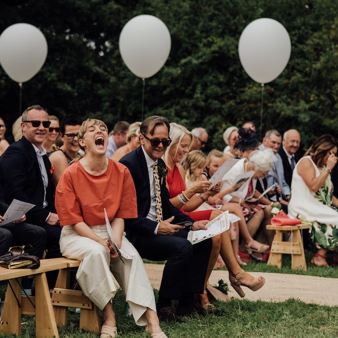 Wedding Ceremony | Giant Balloon Decor | Outdoor Wedding Ceremony &amp; Tipi Reception Planned by Benessamy Events | Red on Blonde Photography