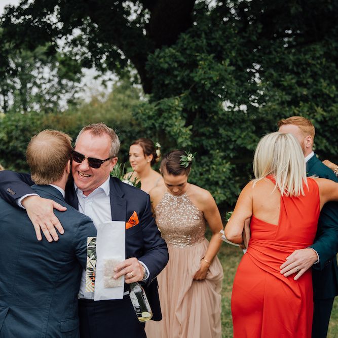 Wedding Guests | Outdoor Wedding Ceremony &amp; Tipi Reception Planned by Benessamy Events | Red on Blonde Photography