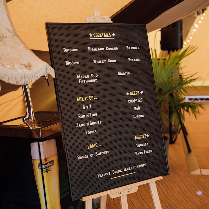 Barber Board Cocktail Sign | Outdoor Wedding Ceremony &amp; Tipi Reception Planned by Benessamy Events | Red on Blonde Photography
