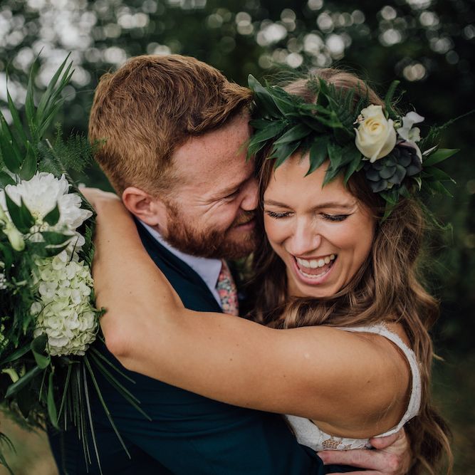 White &amp; Green Bouquet | Bride in La Sposa Gown from Mirror Mirror Bridal | Groom in Paul Smith Suit | Outdoor Wedding Ceremony &amp; Tipi Reception Planned by Benessamy Events | Red on Blonde Photography