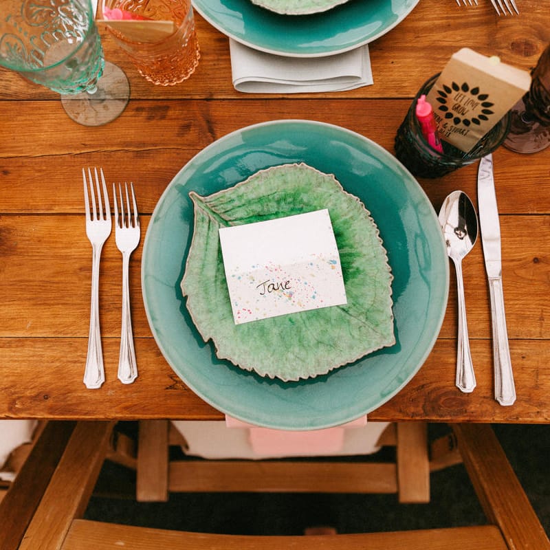 Place Setting with Colourful Tableware and Name Place Cards