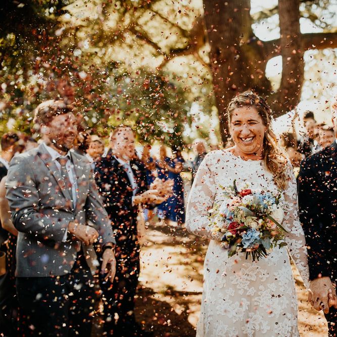 Colourful confetti at village hall wedding in Kent