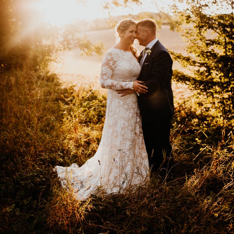 Bride and groom steal a moment for some golden hour shots