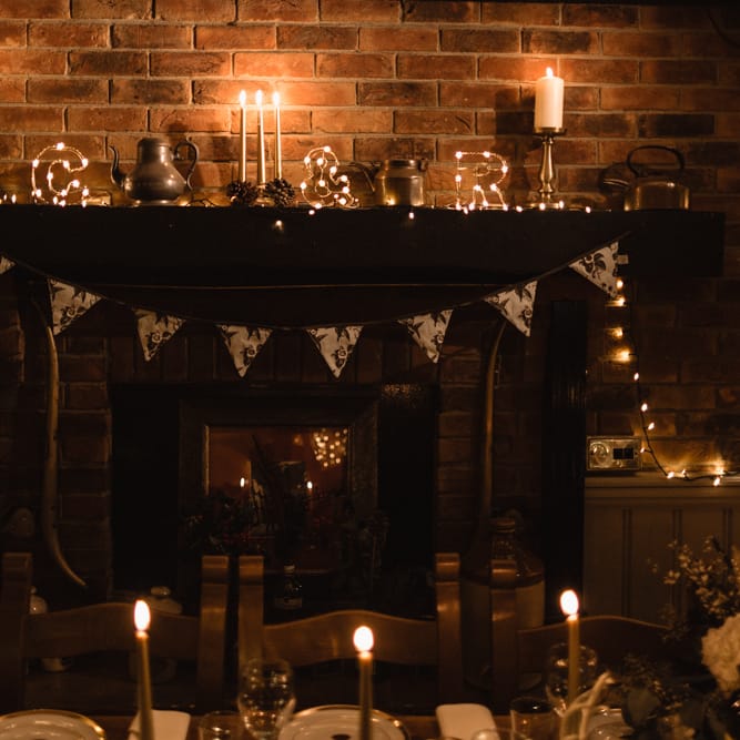 Christmas Pub Wedding At The Falcon Rotherwick With Bride In Alice By Watters And Candle Lit Wedding Ceremony Images By Rebecca Searle Photography
