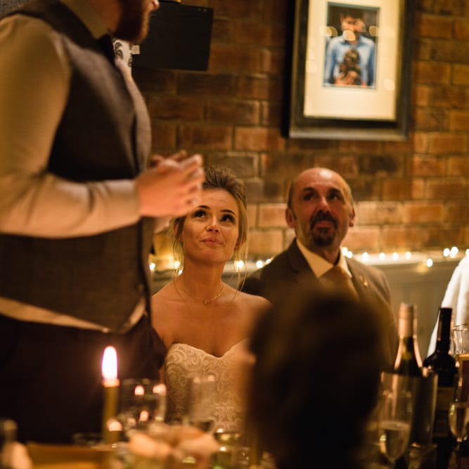 Christmas Pub Wedding At The Falcon Rotherwick With Bride In Alice By Watters And Candle Lit Wedding Ceremony Images By Rebecca Searle Photography