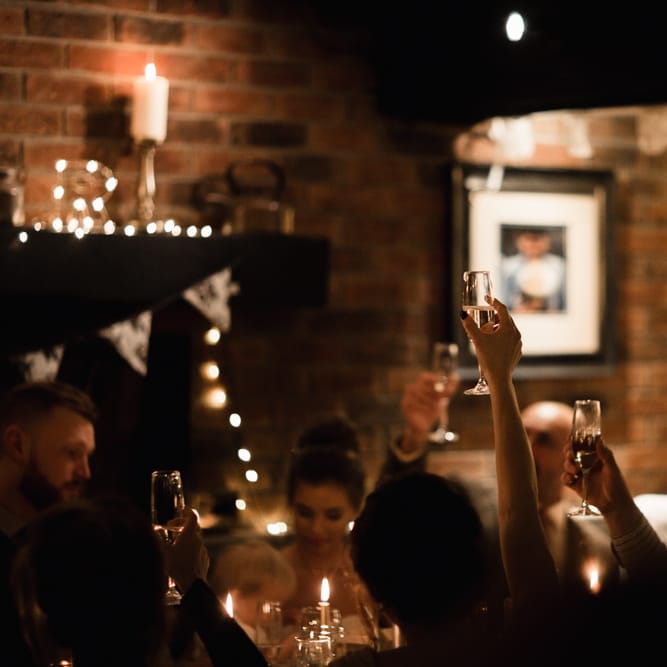 Christmas Pub Wedding At The Falcon Rotherwick With Bride In Alice By Watters And Candle Lit Wedding Ceremony Images By Rebecca Searle Photography