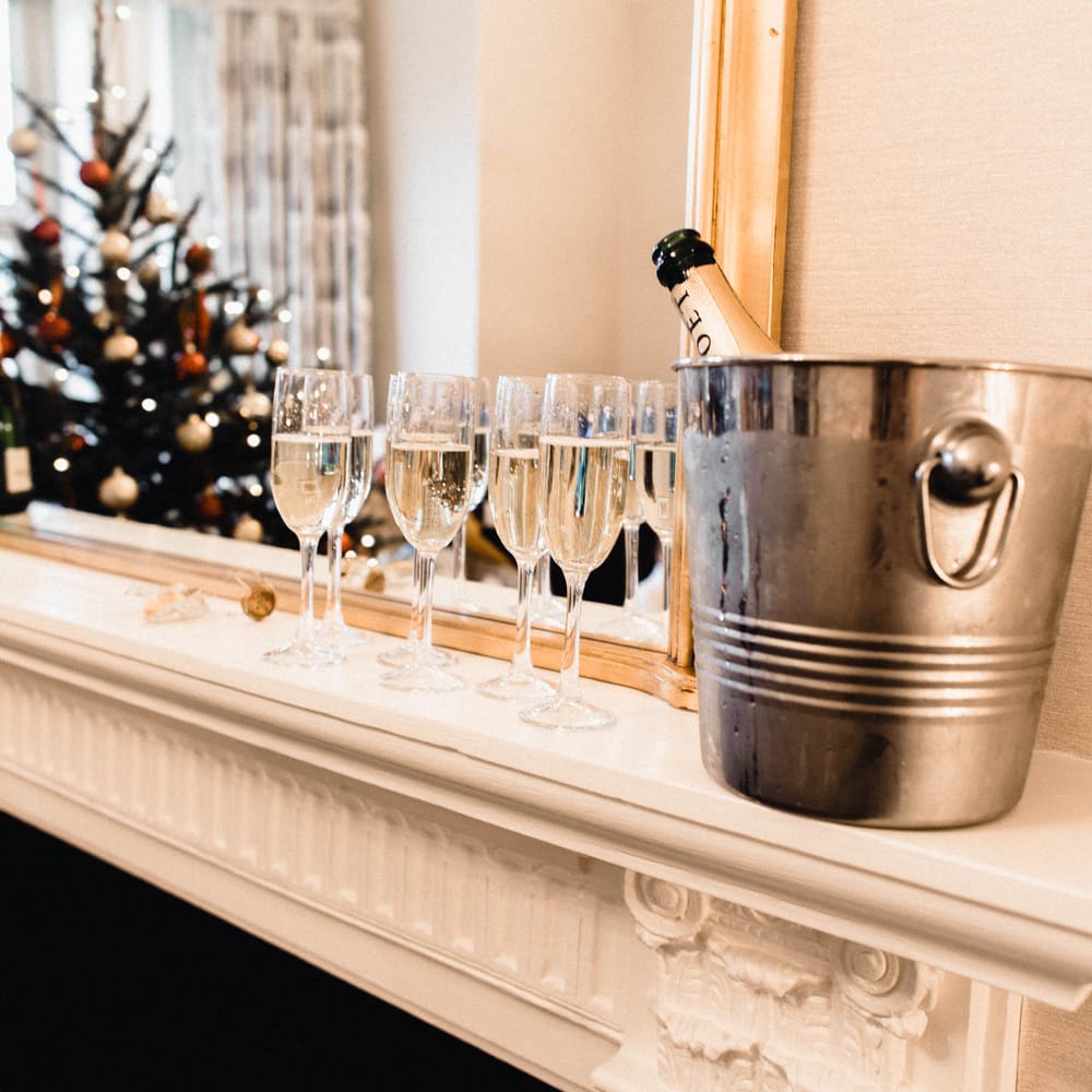 Christmas Pub Wedding At The Falcon Rotherwick With Bride In Alice By Watters And Candle Lit Wedding Ceremony Images By Rebecca Searle Photography