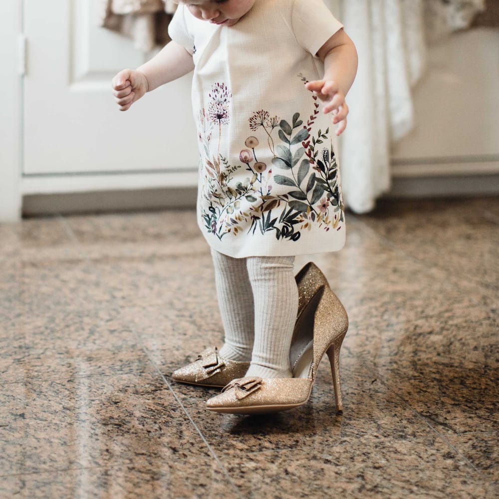 Flower Girl In Zara Baby Dress // Christmas Pub Wedding At The Falcon Rotherwick With Bride In Alice By Watters And Candle Lit Wedding Ceremony Images By Rebecca Searle Photography