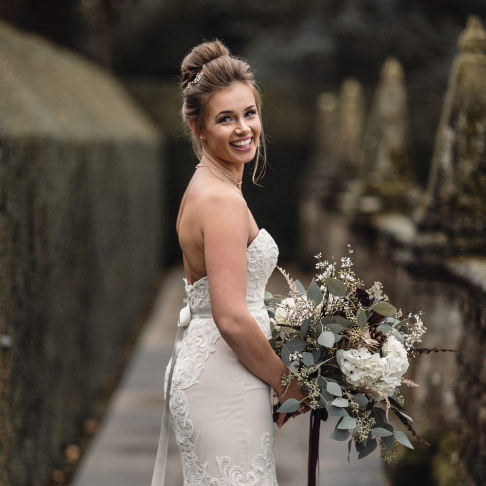 Bride &amp; Bridesmaids In Winter Wedding Attire // Bride In Alice Dress By Watters // Christmas Pub Wedding At The Falcon Rotherwick With Bride In Alice By Watters And Candle Lit Wedding Ceremony Images By Rebecca Searle Photography