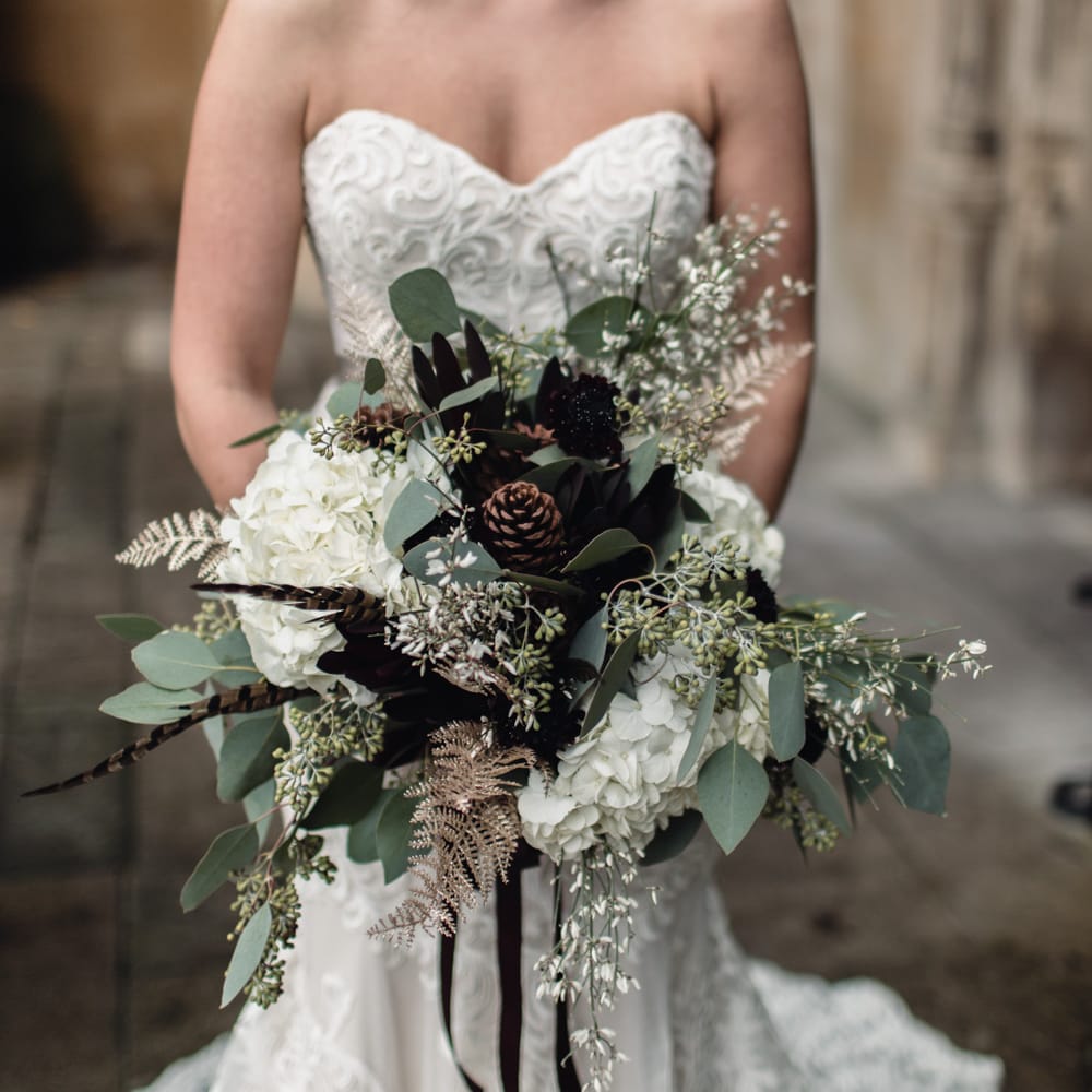 Winter Wedding Bouquet // Bride In Alice Dress By Watters // Christmas Pub Wedding At The Falcon Rotherwick With Bride In Alice By Watters And Candle Lit Wedding Ceremony Images By Rebecca Searle Photography