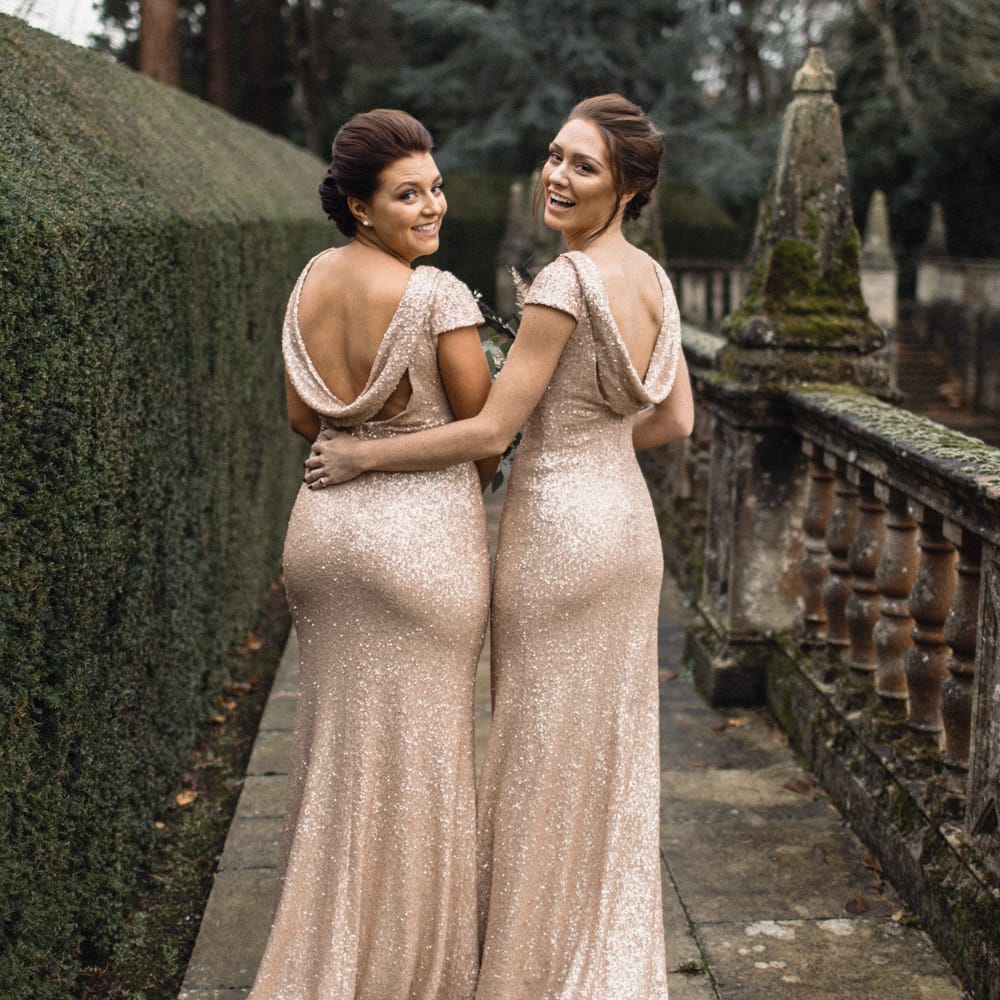 Bridesmaids In Pale Gold Sequinned Dresses // Christmas Pub Wedding At The Falcon Rotherwick With Bride In Alice By Watters And Candle Lit Wedding Ceremony Images By Rebecca Searle Photography