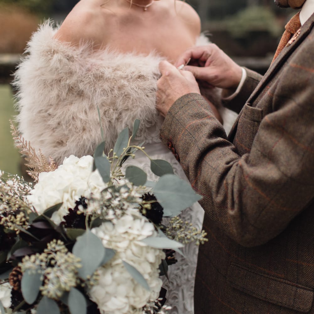 Winter Wedding Bouquet // Christmas Pub Wedding At The Falcon Rotherwick With Bride In Alice By Watters And Candle Lit Wedding Ceremony Images By Rebecca Searle Photography