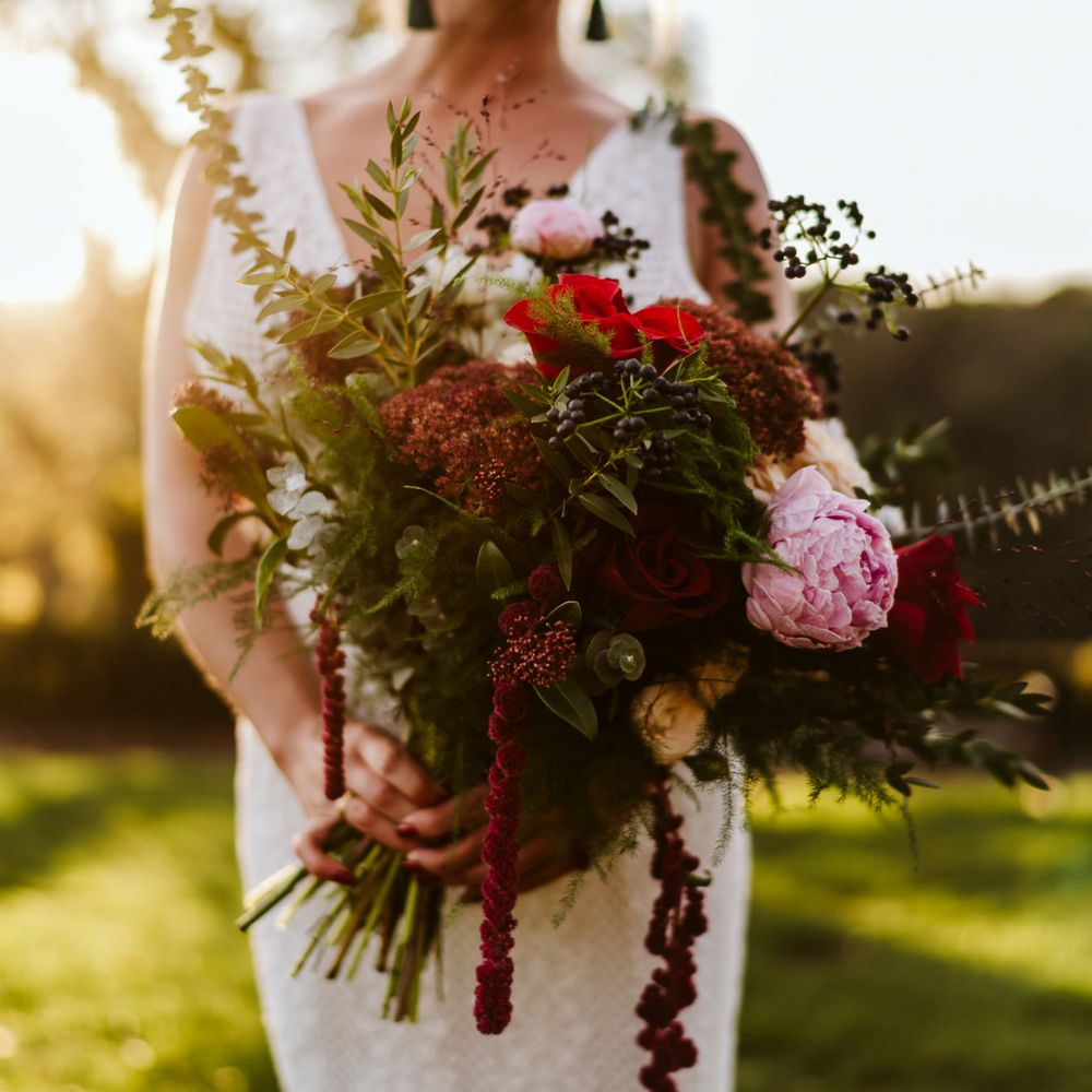 Bride with bold wedding flowers