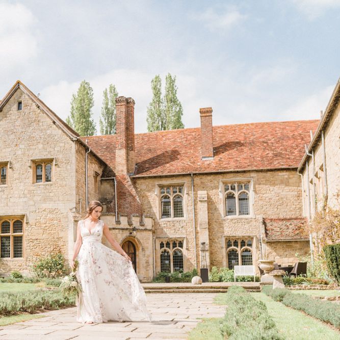 Bride in Stephanie Allin Floral Wedding Dress Walking the Grounds of Notley Abbey