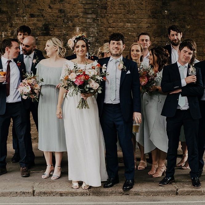 Bride and groom with wedding party at Islington town hall wedding