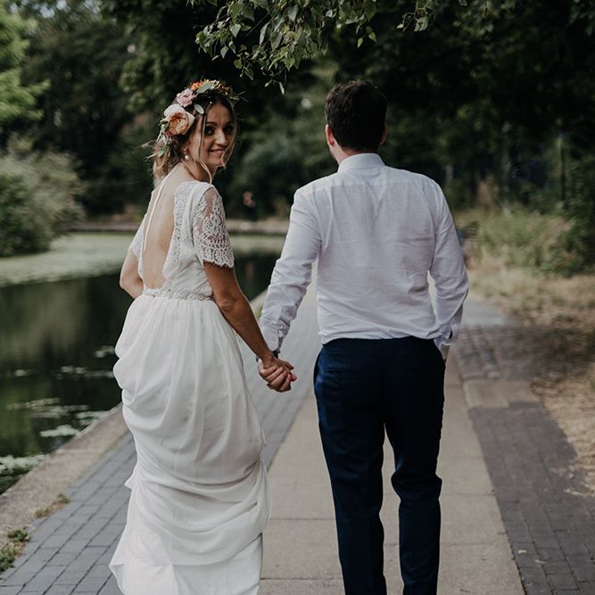 Bride and groom take a walk after Islington town hall wedding