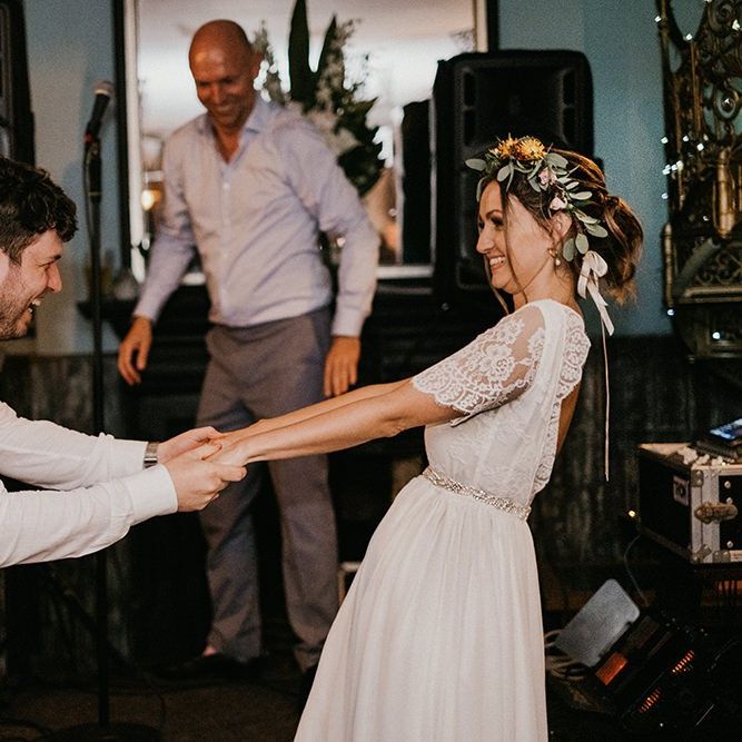 Bride and groom first dance at city wedding