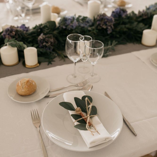 Elegant Place Setting with Olive Branch