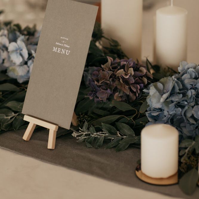 Greenery Table Runner with Candles and Menu Card on Miniature Easel