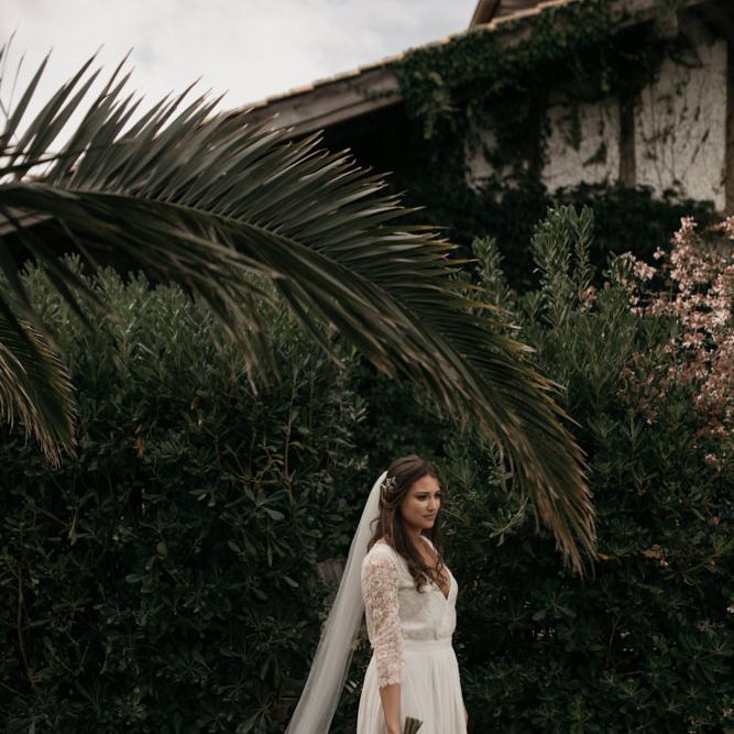 Bride in Donatelle Godart Wedding Dress  with Lace Long Sleeves