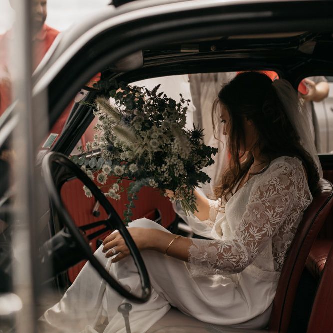 Bride in Donatelle Godart Wedding Dress Getting into Black Fiat 500 Wedding Car