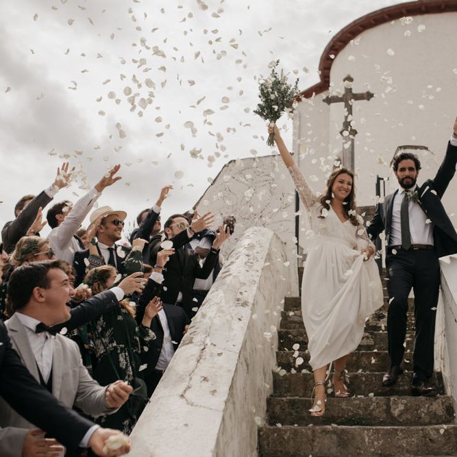 Confetti Moment with Bride in Donatelle Godart Wedding Dress &amp; Groom in De Fursac Suit
