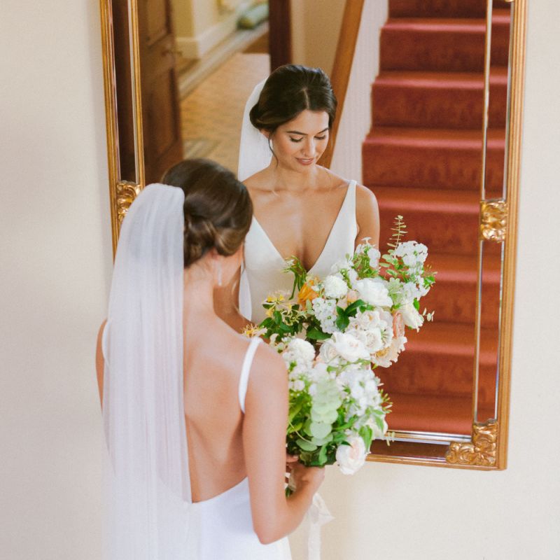 Cathedral veil with lace detail  and open back wedding dress