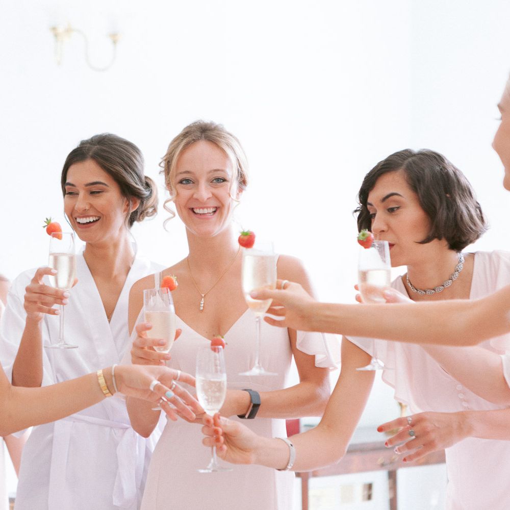 Bridal party preparations toasting the big day