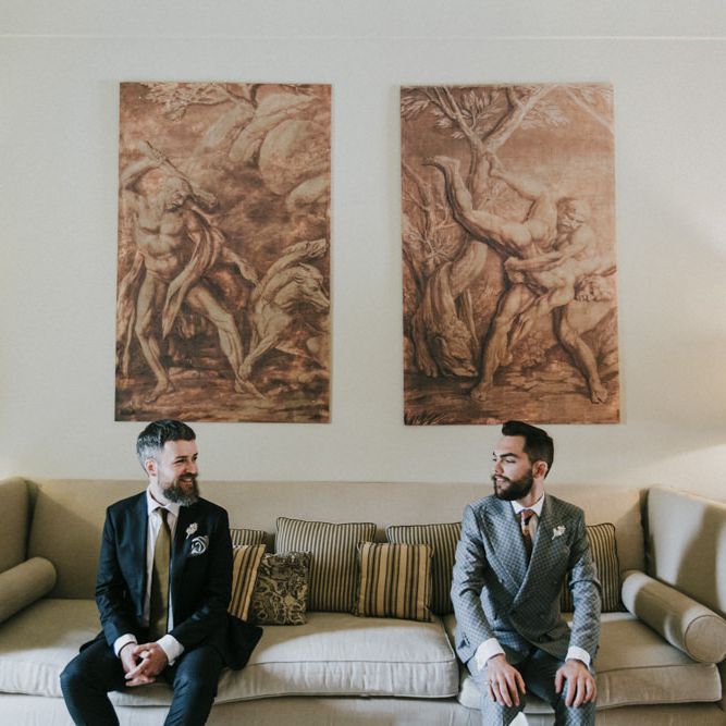 Grooms get ready for wedding in grey groom suit