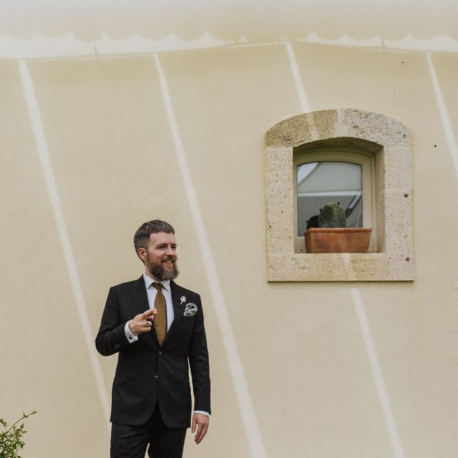 Groom prepares for wedding ceremony