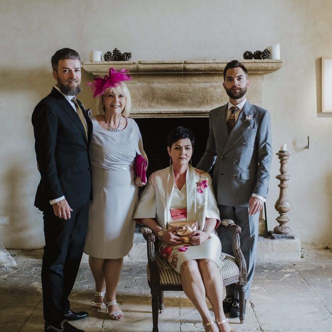 Grooms with their mothers in grey groom suit