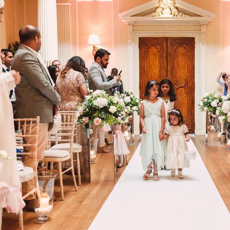 Flower Girls Walking Down The Aisle