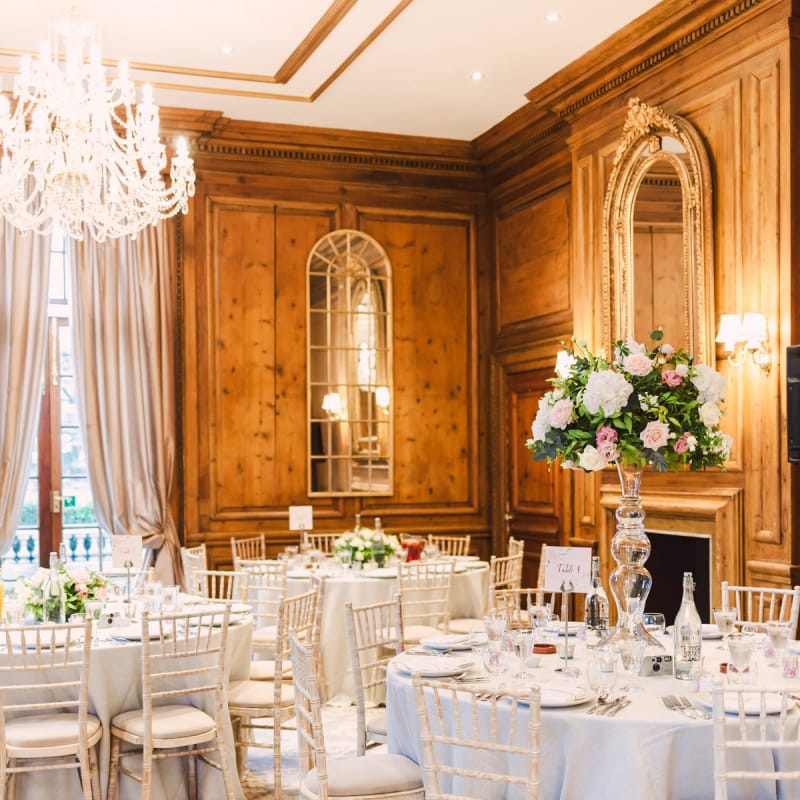 Header House, Buckinghamshire Wedding Reception with Floral Centrepieces and Fireplace Decor