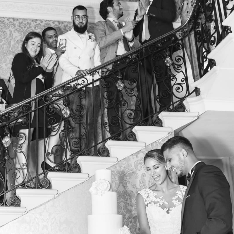Bride and Groom Cutting The Wedding Cake