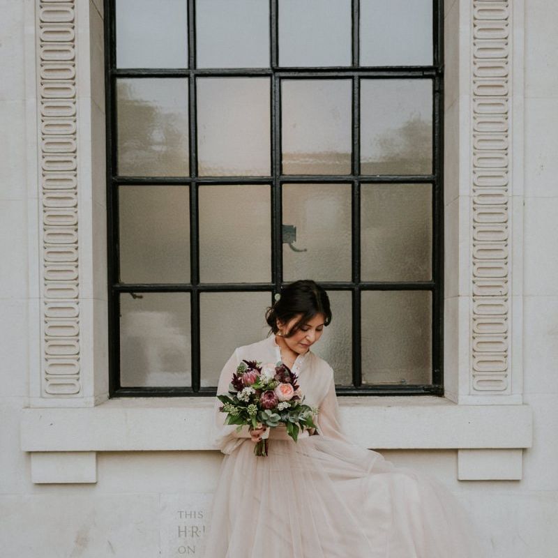 Bride in blush tulle skirt and top bridal separates