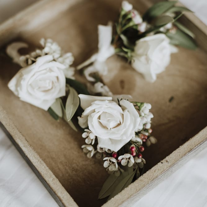 White wedding buttonholes