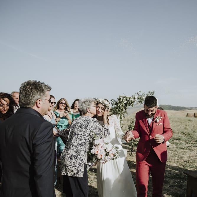 Bride in Laure de Sagazan wedding dress during ceremony