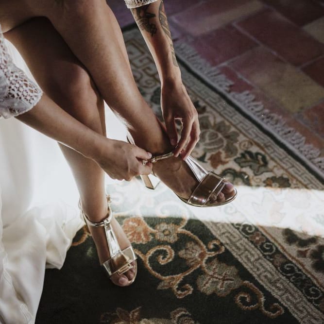 Gold wedding shoes with Laure de Sagazan bride dress