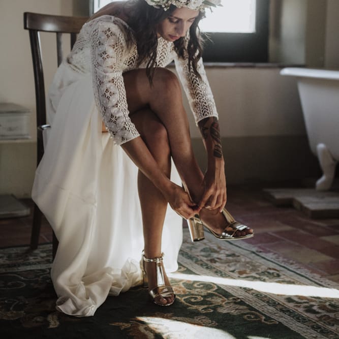 Gold wedding shoes with Laure de Sagazan bride dress