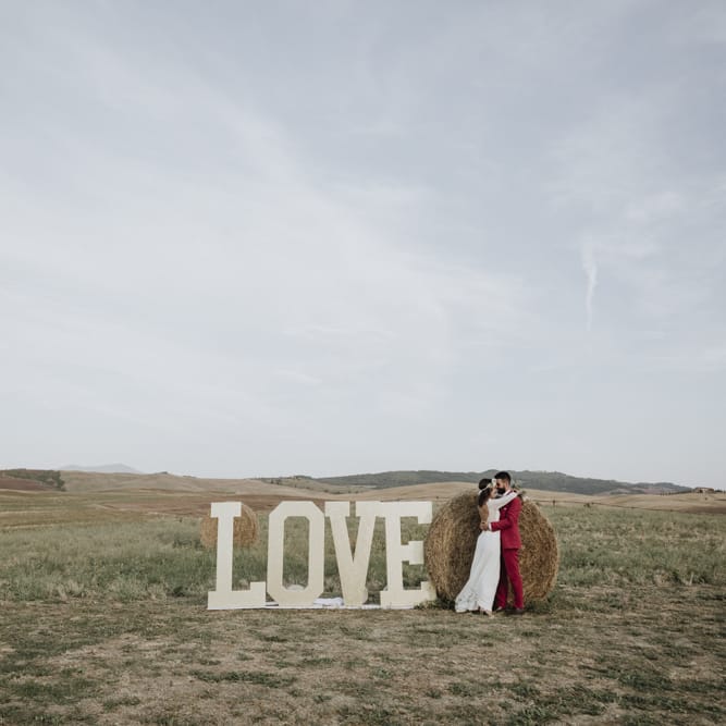 Italian wedding with large 'LOVE' letters
