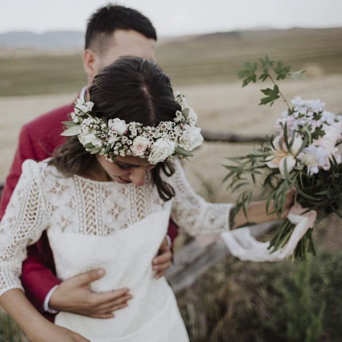 Bridal bouquet and flower crown for bride in  Laure de Sagazan wedding dress