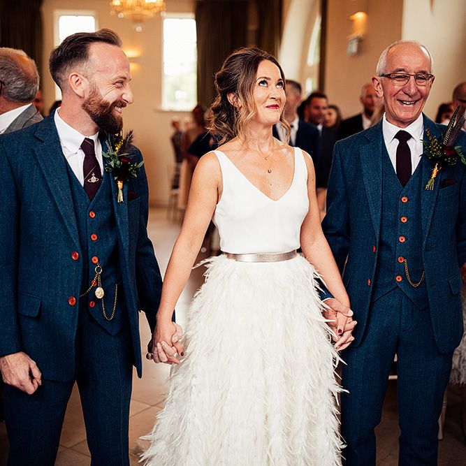 Bride in Charlie Brear Payton Bridal Gown &amp; Piora Feather Skirt at The Altar with Her Groom and Father